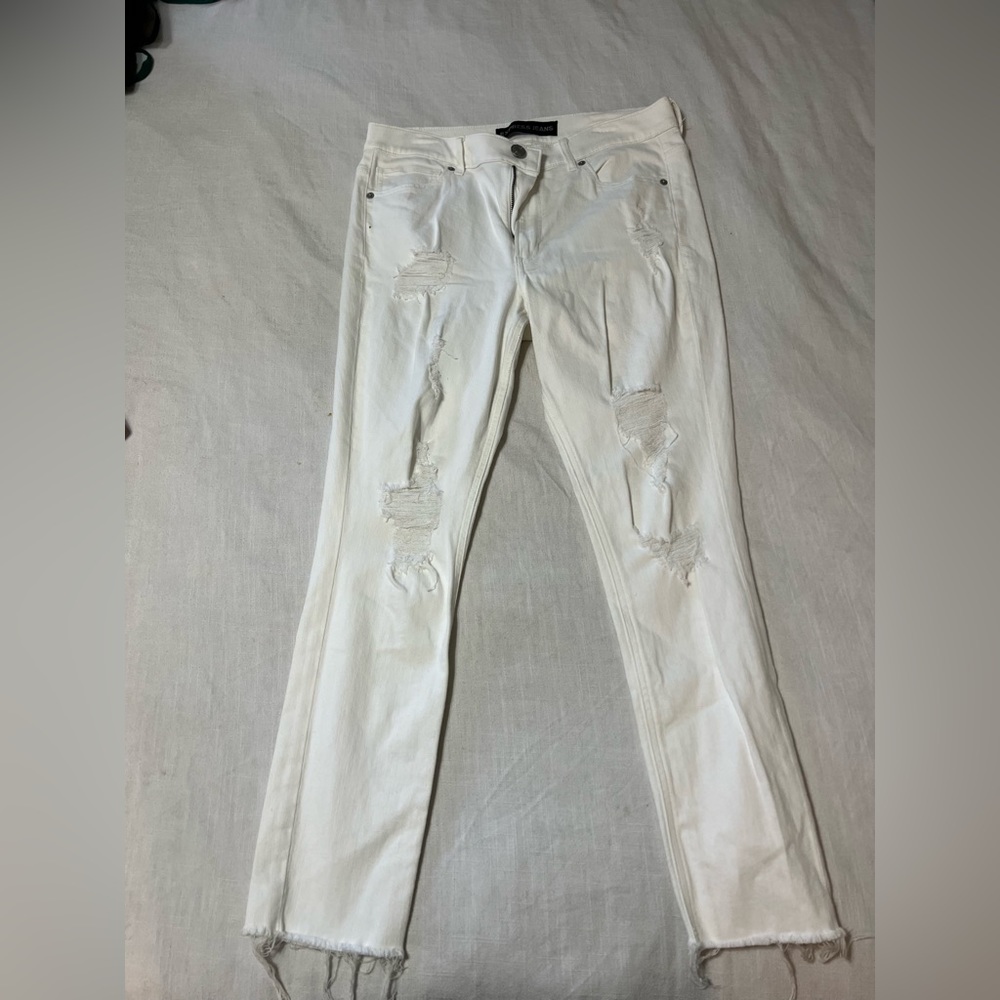 Express white jeans with rips size 12